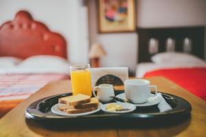 Ένα ή περισσότερα κρεβάτια σε δωμάτιο στο Hotel Excalibur
