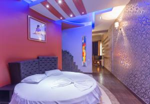 Letto o letti in una camera di Green Palace Hotel