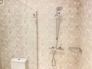 a bathroom with a shower and a toilet at Amber Lodge Hickstead-B in Haywards Heath +25 photos