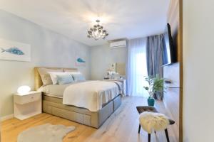 Posteľ alebo postele v izbe v ubytovaní PIA Apartment
