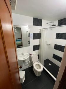 Koupelna v ubytování Hotel Maratea Melgar