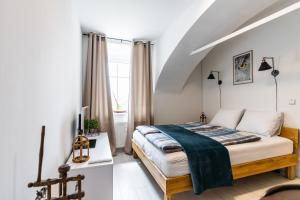 Postel nebo postele na pokoji v ubytování Sofia Apartment & Zimmer