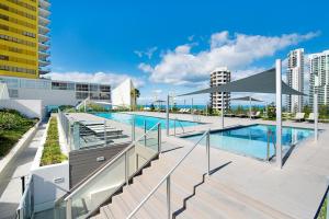 a swimming pool on the side of a building at ULTIQA Air On Broadbeach in Gold Coast