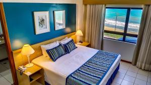 Postel nebo postele na pokoji v ubytování Hotel Reymar Express