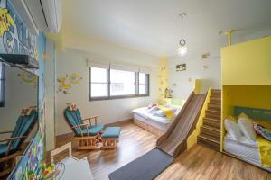 We Smile B&B tesisinde bir odada yatak veya yataklar