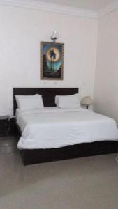 Cama o camas de una habitación en Room in Lodge - Helena Haven Hotels and Suites