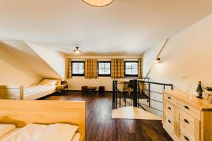 Postel nebo postele na pokoji v ubytování Apartmány Na Soutoku - Březník
