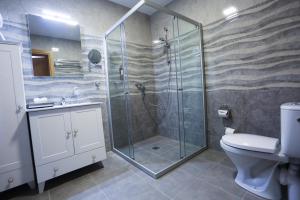 Koupelna v ubytování Hotel Jonapolis