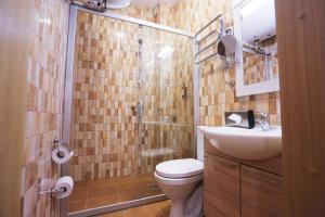 Koupelna v ubytování Hotel Jonapolis