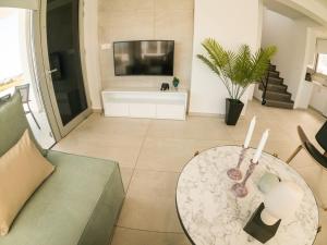 TV a/nebo společenská místnost v ubytování Imperial Jade Villas Gold Emerging Villas 3
