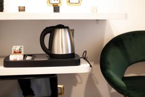 Coffee and tea making facilities at Hotel Cinquantatre