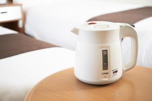 Příslušenství pro přípravu čaje a kávy v ubytování Toyooka Sky Hotel