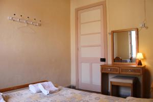 Voodi või voodid majutusasutuse Trianon toas