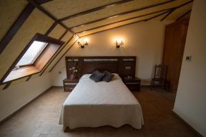 Postel nebo postele na pokoji v ubytování Hotel Casa Beletri
