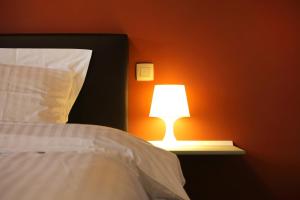 Letto o letti in una camera di B&B Back2Front