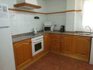 Kuchyňa alebo kuchynka v ubytovaní 0307 Villa Monte Verde Nispero