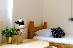 Posteľ alebo postele v izbe v ubytovaní Stay Swanky Hostel