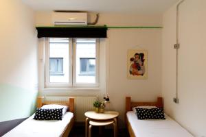 Posteľ alebo postele v izbe v ubytovaní Stay Swanky Hostel