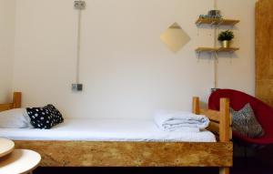 Posteľ alebo postele v izbe v ubytovaní Stay Swanky Hostel