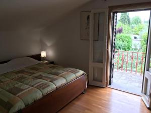 Ένα ή περισσότερα κρεβάτια σε δωμάτιο στο Aurora best bnb sea and mountains