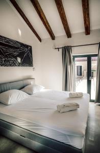 Ένα ή περισσότερα κρεβάτια σε δωμάτιο στο Villa Mala ZadarVillas +47 φωτογραφίες