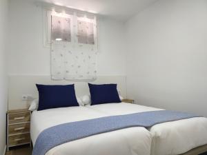 En eller flere senge i et værelse på ACAPULCO AMAZING VIEWS. POOL. FREE WIFI