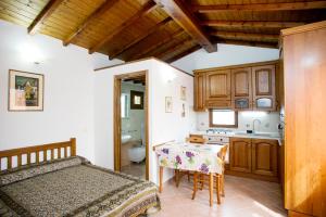 A kitchen or kitchenette at Residenza Le Tartarughe