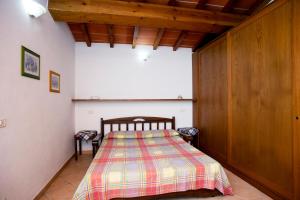A bed or beds in a room at Residenza Le Tartarughe