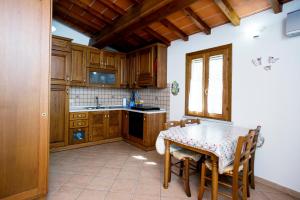 A kitchen or kitchenette at Residenza Le Tartarughe