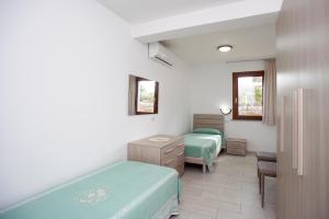 A seating area at Residenza Le Tartarughe
