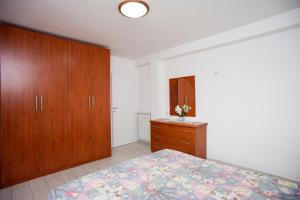 A bed or beds in a room at Residenza Le Tartarughe