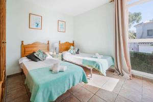 Postel nebo postele na pokoji v ubytování 3381 Villa Angela Flores
