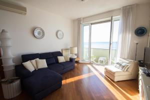 Χώρος καθιστικού στο Splendido appartamento fronte mare con box doppio