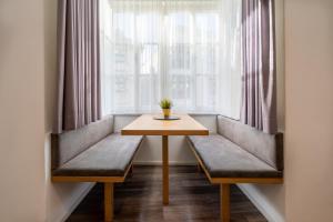 Posedenie v ubytovaní Kaiser Max Design Appartements