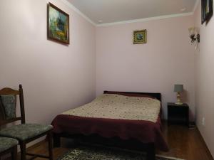 Кровать или кровати в номере Apartments Truskavets