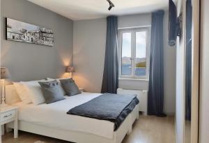 Ένα ή περισσότερα κρεβάτια σε δωμάτιο στο Hotel Korsal