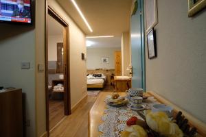 Postel nebo postele na pokoji v ubytování Hotel Granta Parey
