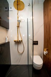 Ett badrum på Apartament Gold - Racławickie 28a