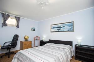Posteľ alebo postele v izbe v ubytovaní Bilocale Silvia con vista mare - Goelba
