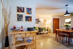 a living room with a table and a dining room at Casa TerraSun in Silvi Paese