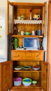 A kitchen or kitchenette at Sa dommo de Mammai