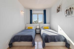 Postel nebo postele na pokoji v ubytování Flatguest Trebolina - 3Bdr - FastWiFi - Parking