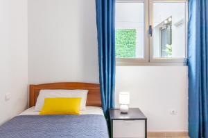 Postel nebo postele na pokoji v ubytování Flatguest Trebolina - 3Bdr - FastWiFi - Parking