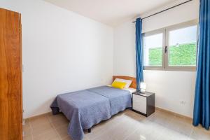 Postel nebo postele na pokoji v ubytování Flatguest Trebolina - 3Bdr - FastWiFi - Parking