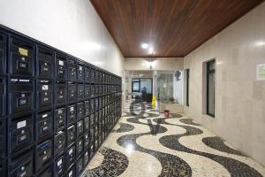 a hallway with a bunch of lockers in a building at Vilamoura Marina Extraordinary 70 m2 T1, Marina 200m , beach 300m in Vilamoura