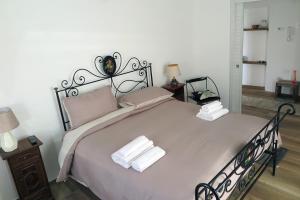 Posteľ alebo postele v izbe v ubytovaní Affittacamere Casa Cavour