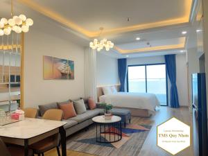 Giường trong phòng chung tại TMS Quy Nhơn Luxury Homestay