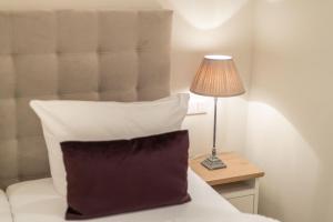 Ein Bett oder Betten in einem Zimmer der Unterkunft Süster Hüs