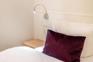 Ein Bett oder Betten in einem Zimmer der Unterkunft Süster Hüs