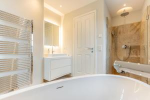 Ein Badezimmer in der Unterkunft Süster Hüs